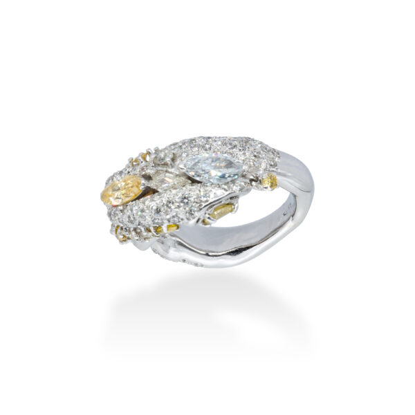 d'Avossa Ring in 18kt white gold with two central Diamonds marquise cut, Fancy yellow and White, on a pavé of white diamonds and two rows of Fancy Yellow diamonds. (3)